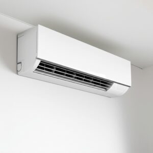 A newly installed split air conditioner unit on a building wall in Tabuk, representing professional and reliable AC installation services